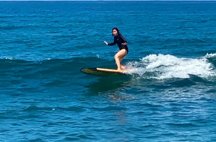 Catherine surfing